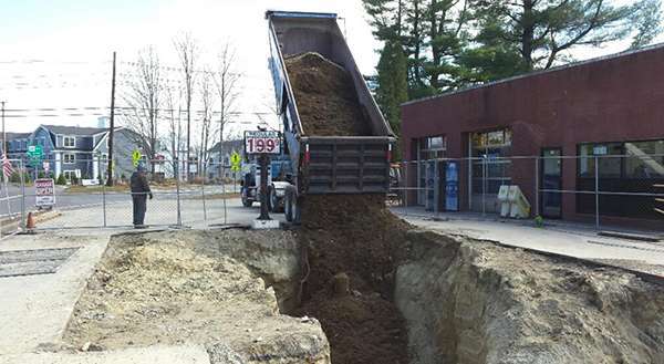 General Properties team working on a gas station project